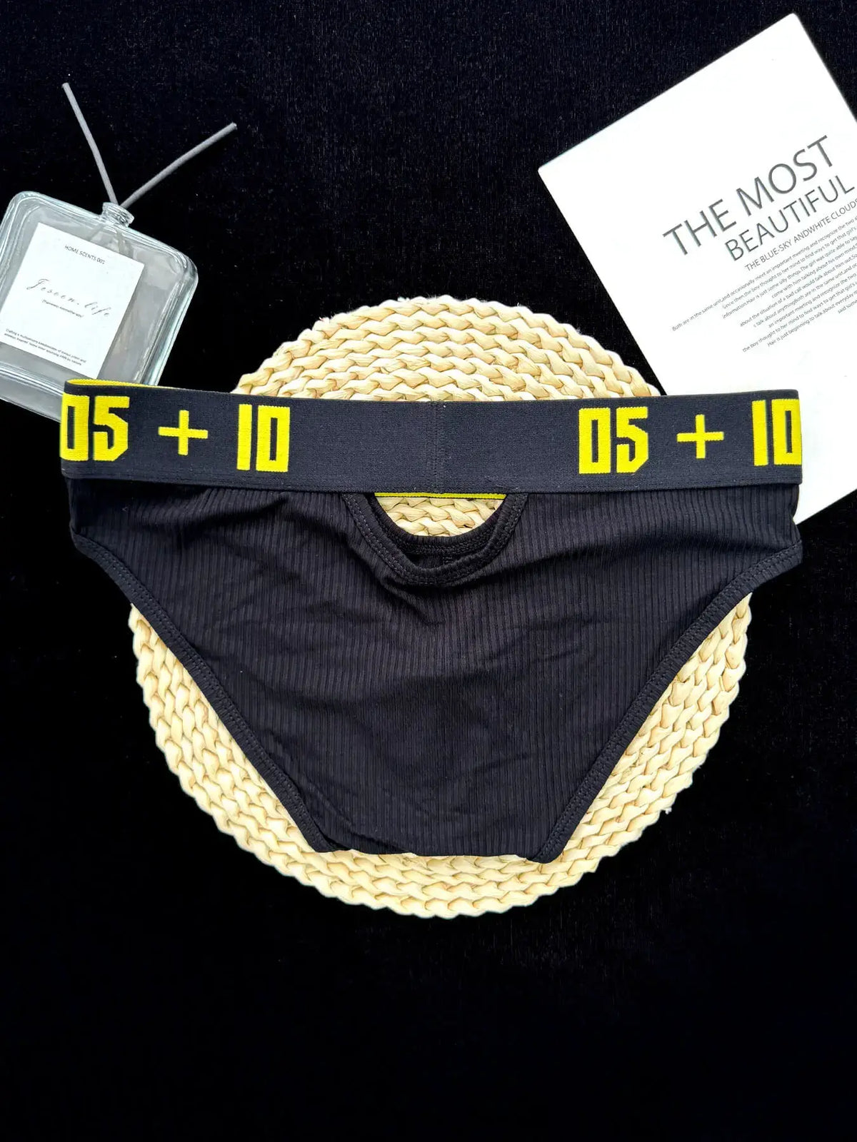 Flat lay of black Cotton Pouch Cutout Low Rise Brief