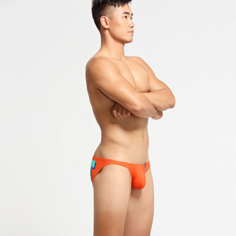 Detailed side view showing orange Varsity Back Print Silky Low Rise Briefs